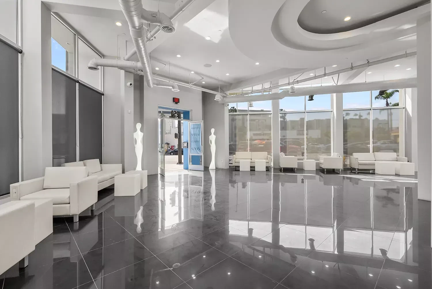 Elegant ambiance — minimalist interior with cream seating and natural light